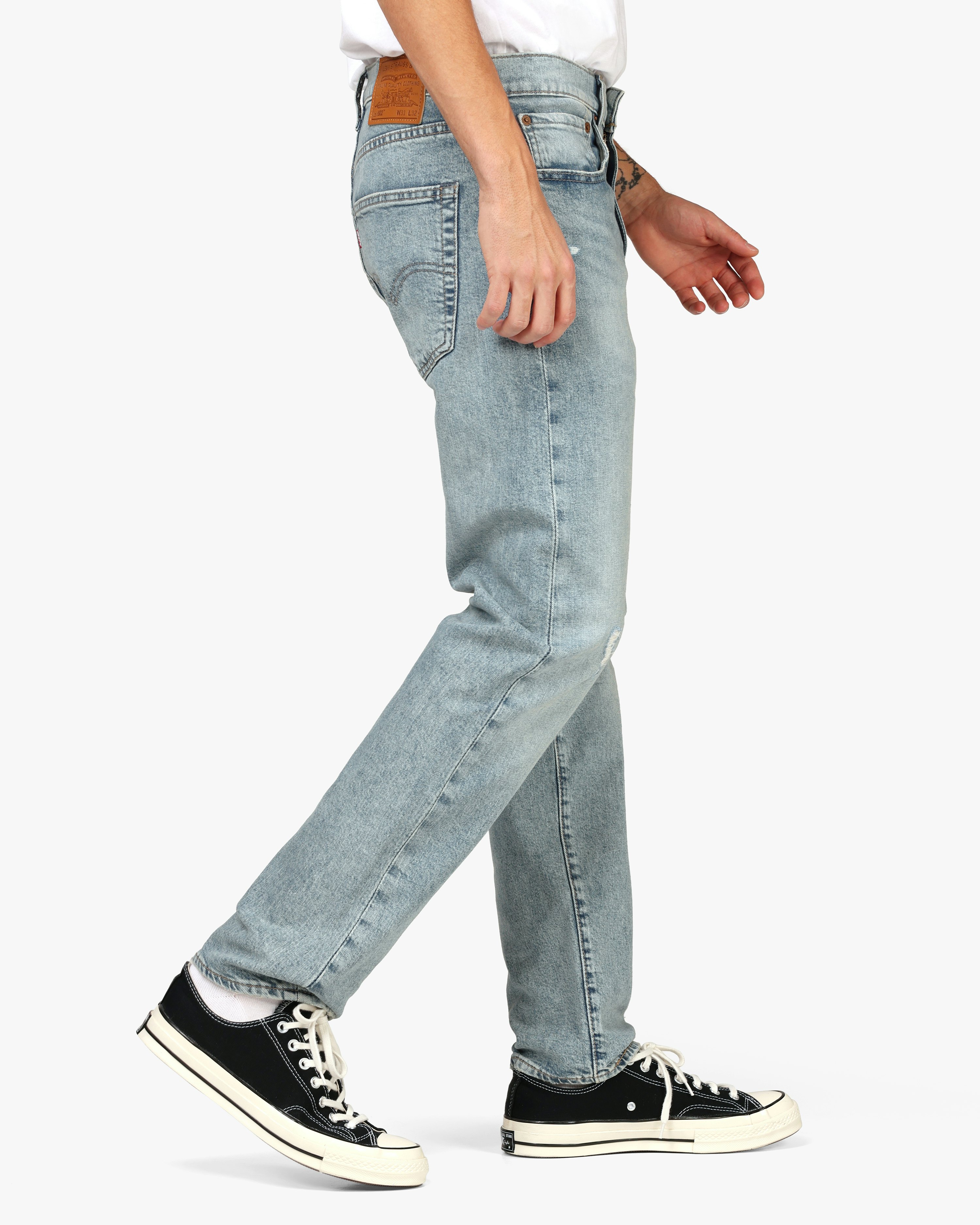 Levis 502™ Tapered Light Blue Ripped Jeans | Men | at 