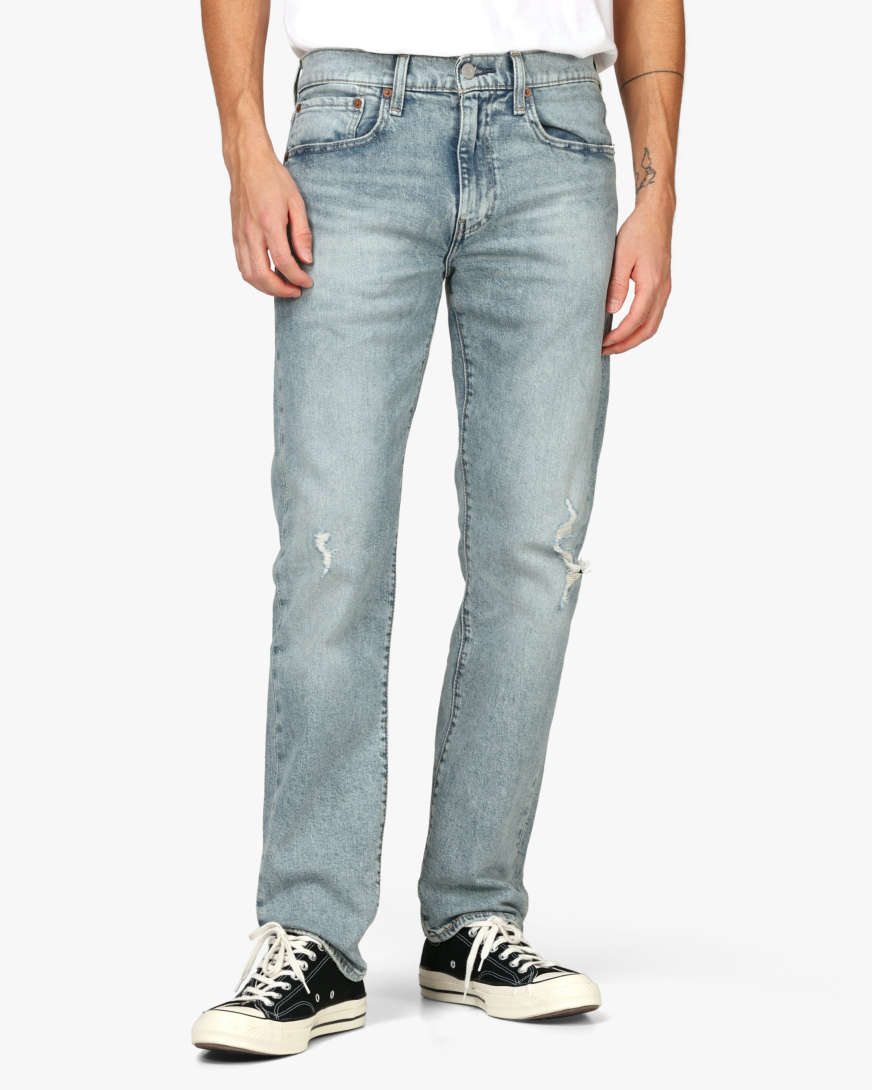 Levis 502™ Tapered Light Blue Ripped Jeans | Men | at 